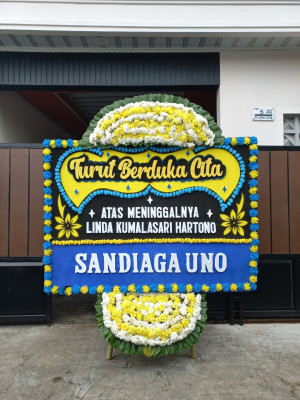 Papan Bunga Duka di Pengilon
